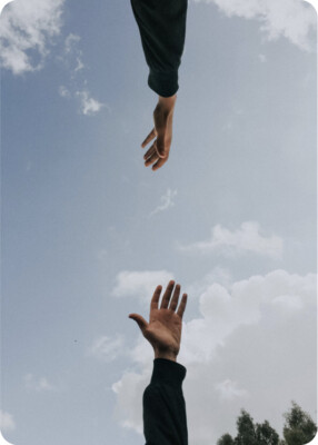 Symbolic image of human connection and customer focus in our tech company.